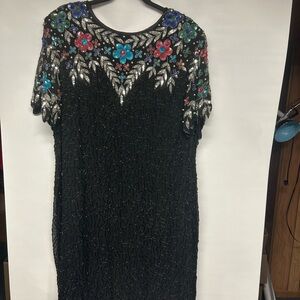 Elegant Black Mini Dress with Floral Embellishments